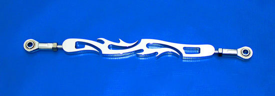 Chrome billet shift link with end bolts. Tribal flames and skulls design. 2 inches over stock length.